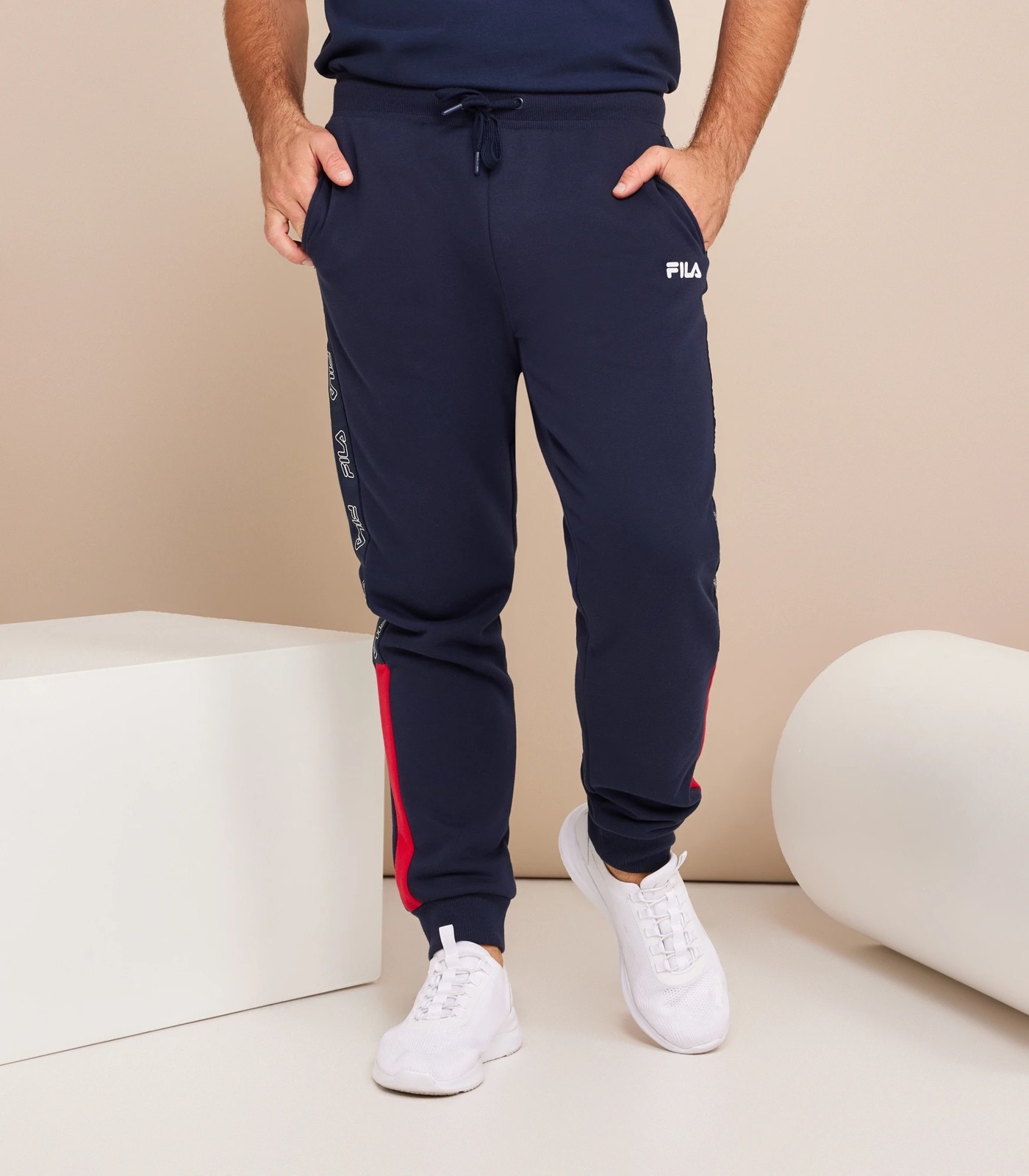 FILA Solid Women Blue Track Pants - Buy FILA Solid Women Blue