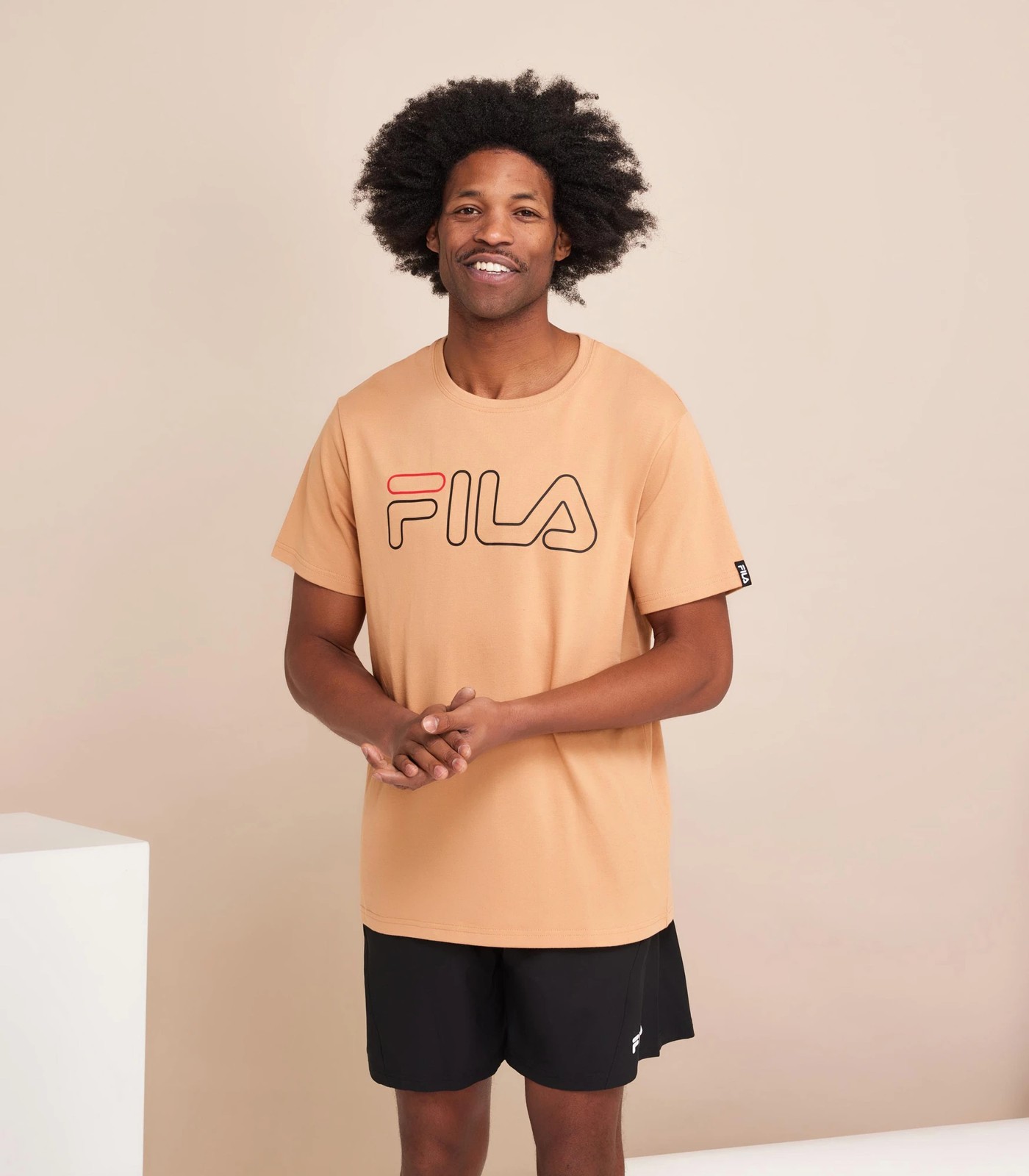 Beige hotsell fila shirt