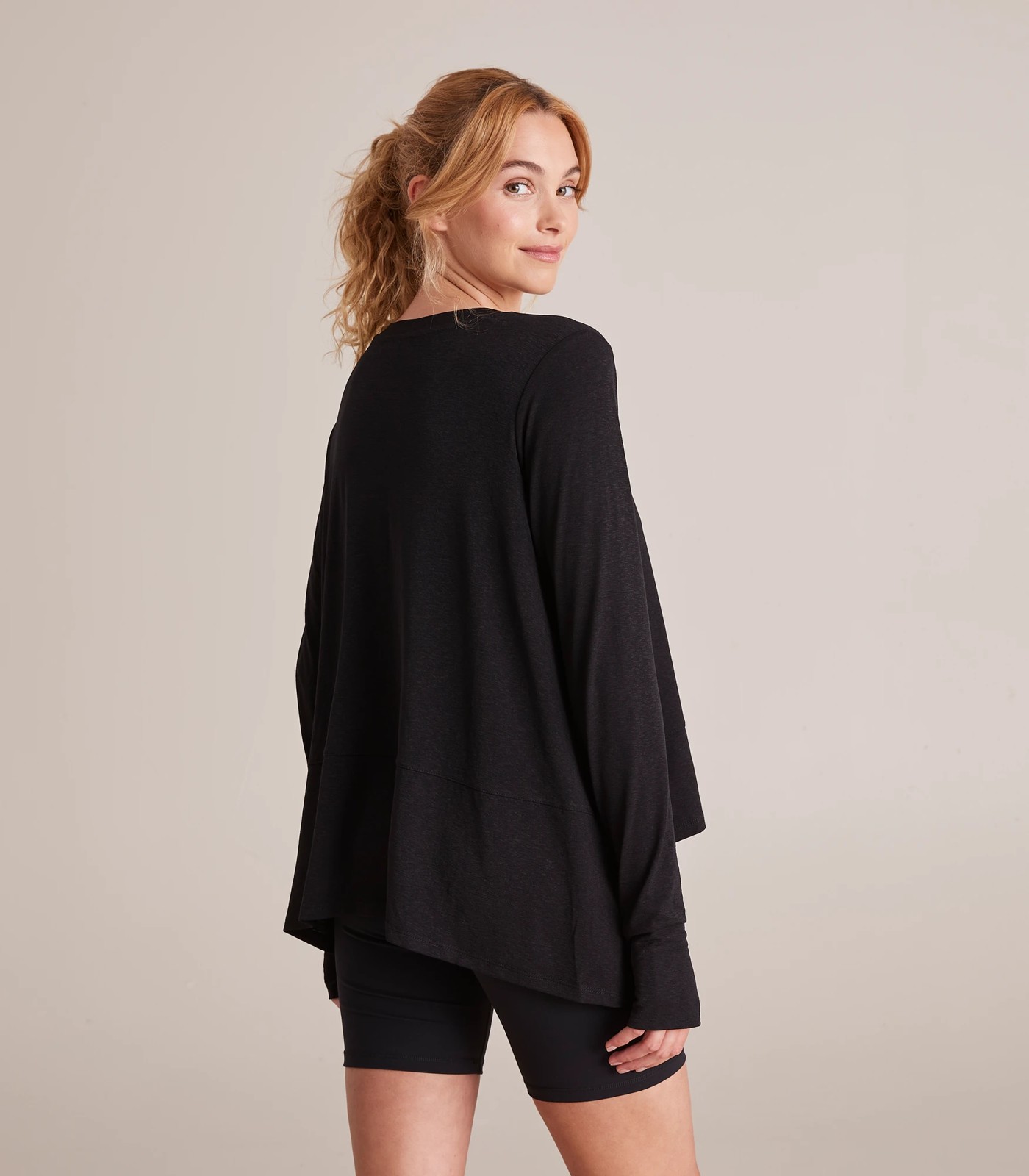 black flowy long sleeve top Cinosural International School