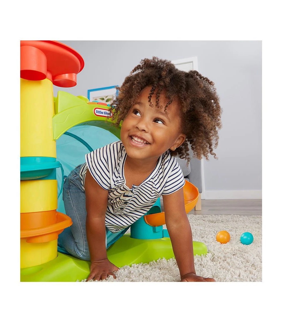 Baby crawl through store toys