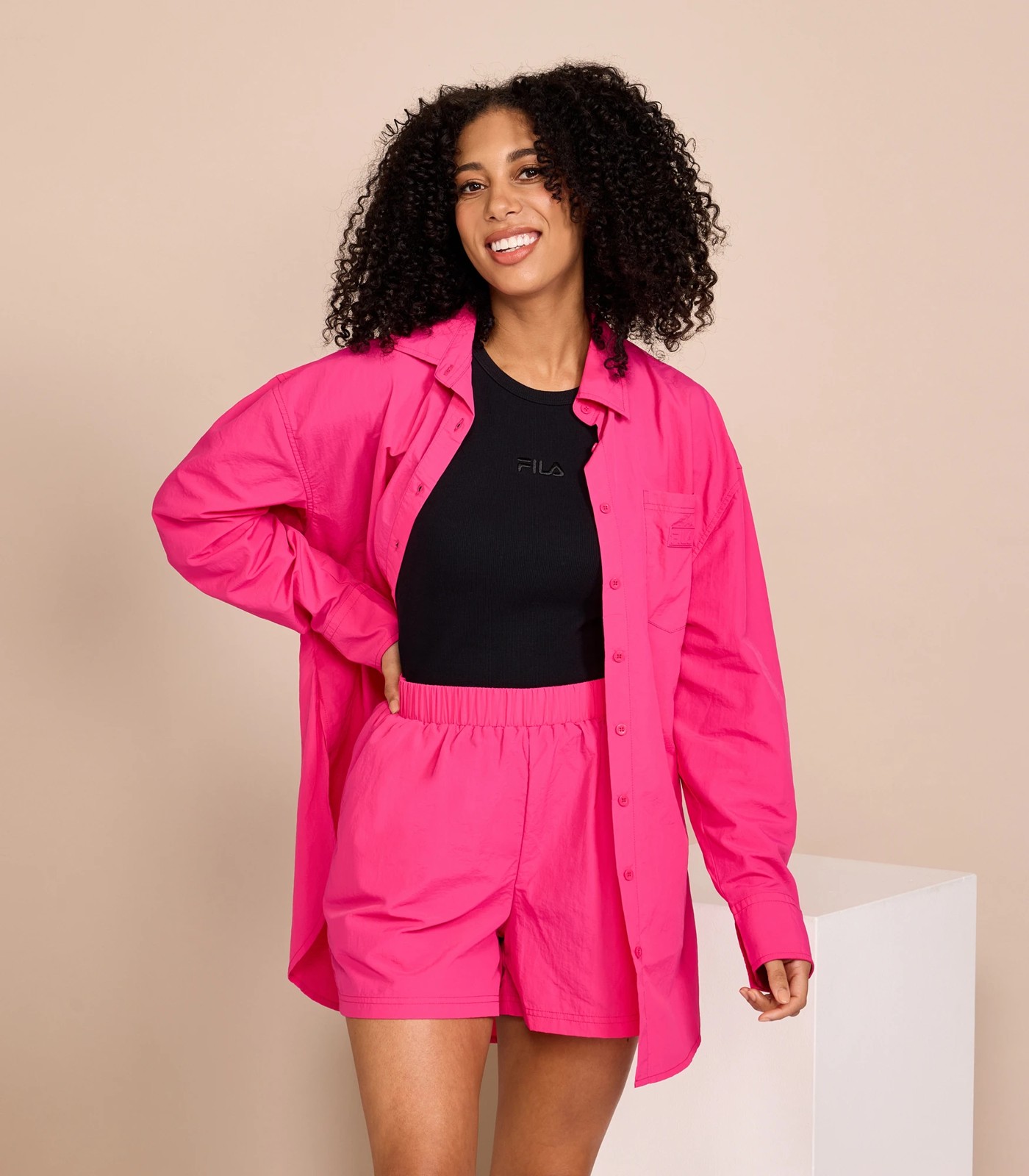 Pink fila shirt womens sale