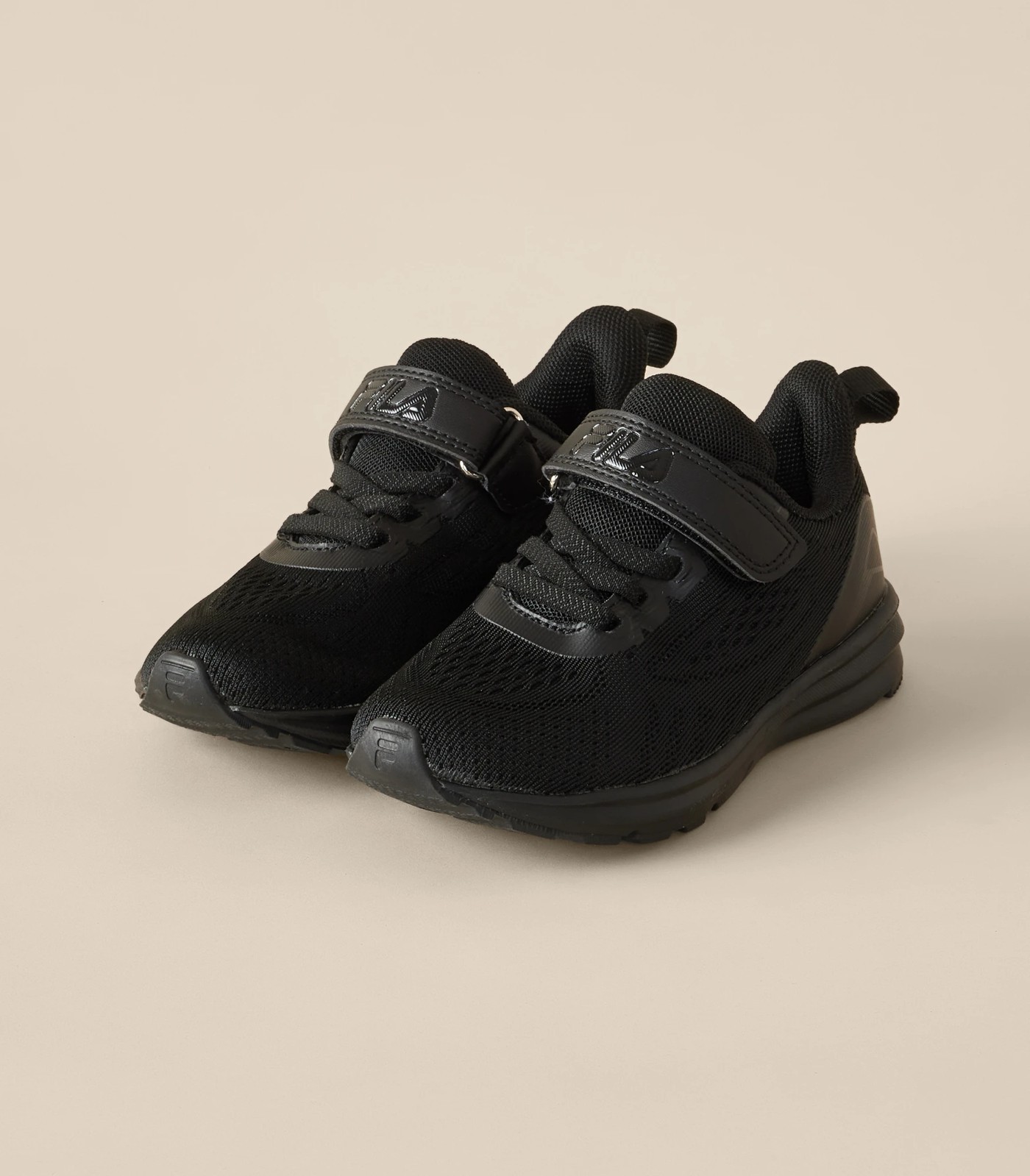 Fila junior black hotsell