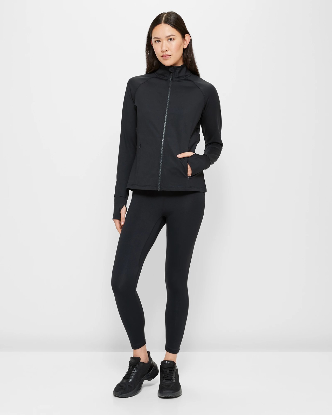 Elevate your activewear game with our versatile TraqLite Half Zip Jacket.  Whether it's for workouts, running, or all-day comfort, this j