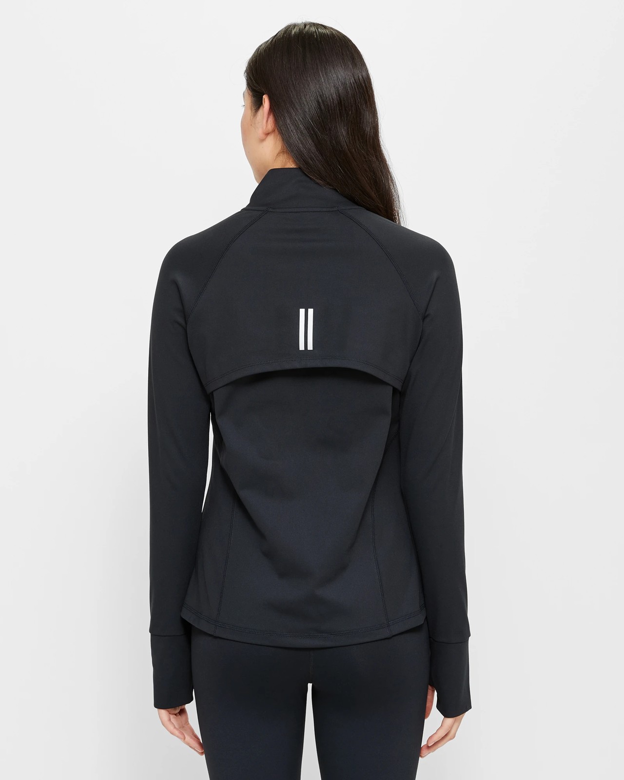 Elevate your activewear game with our versatile TraqLite Half Zip Jacket.  Whether it's for workouts, running, or all-day comfort, this j